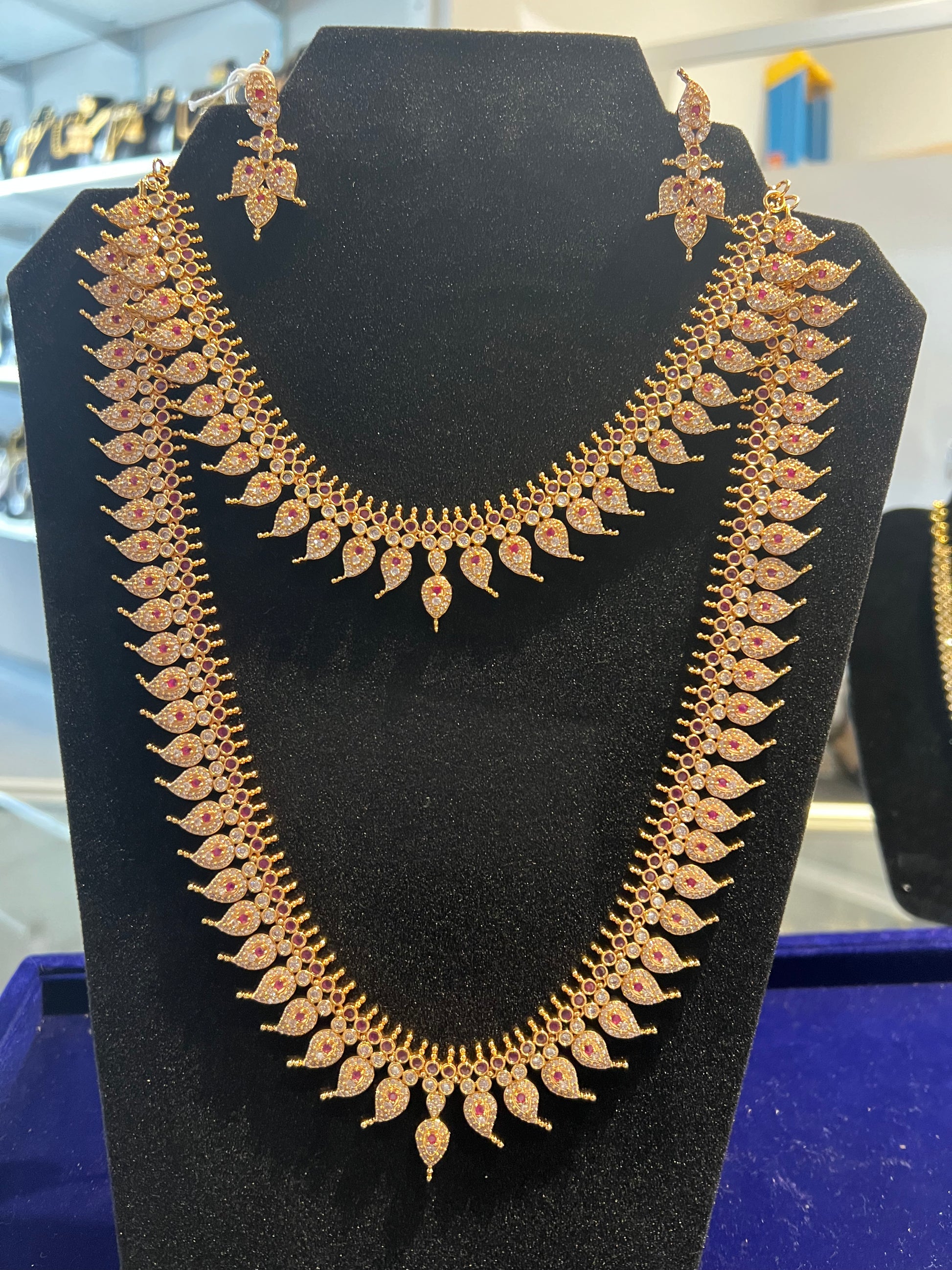 Gorgeous White And Ruby Red Gold Plated Necklace and Long Haram Set With Earrings For Women