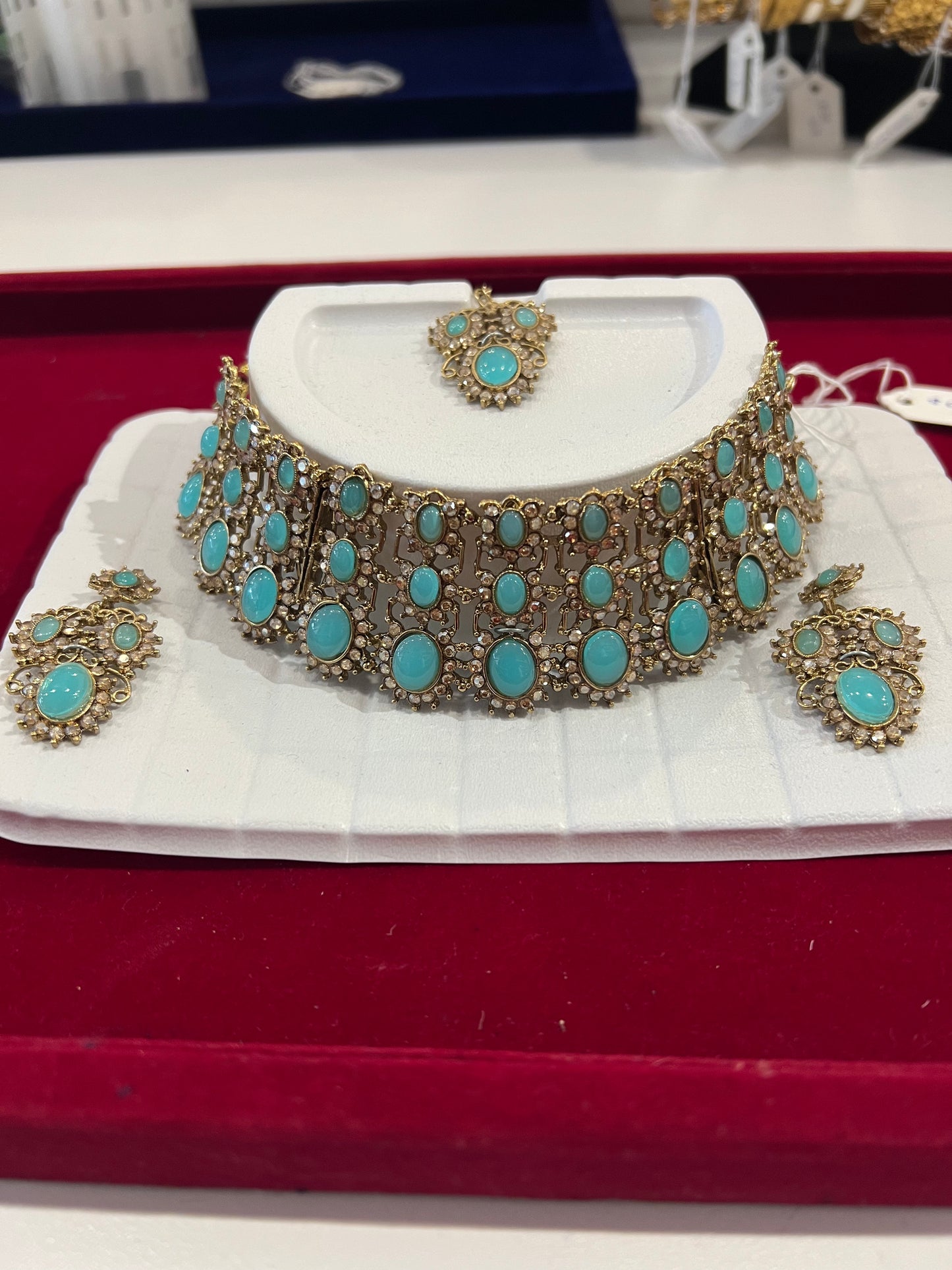 Fabulous Sky Blue And Gold Stones Antique Gold Choker With Maang Tikka And Earrings For Women
