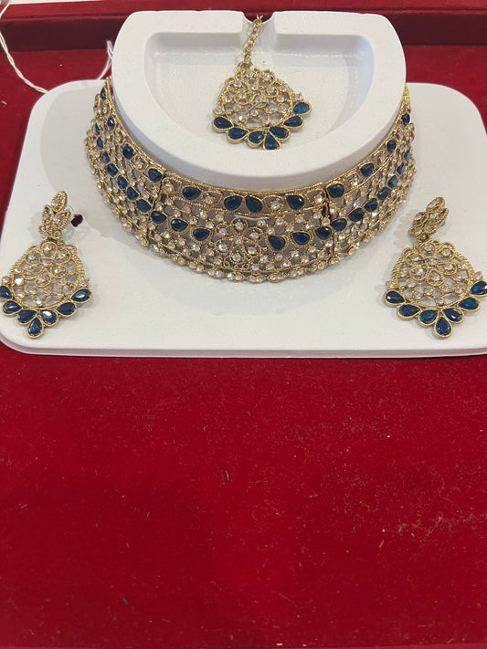 Attractive Dark Blue And Gold Stones Gold Plated Choker With Maang Tikka And Earrings For Women