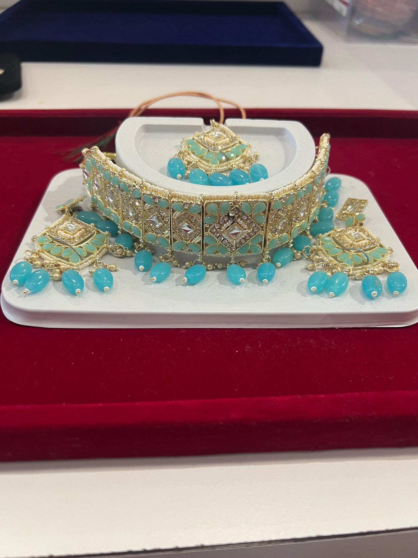 Fabulous Sky Blue Stones And Beads Gold Plated Choker With Maang Tikka And Earrings For Women