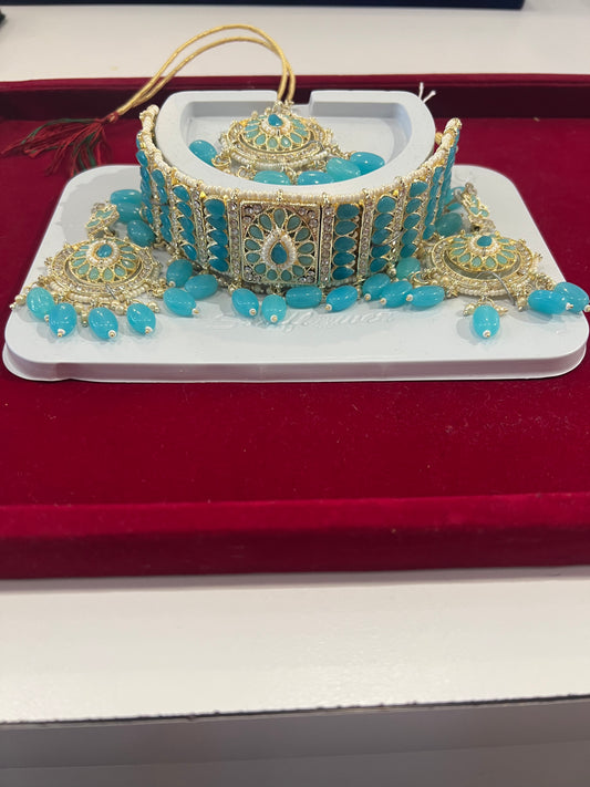 Beautiful Sky Blue Stones And Beads Gold Plated Choker With Maang Tikka And Earrings For Women