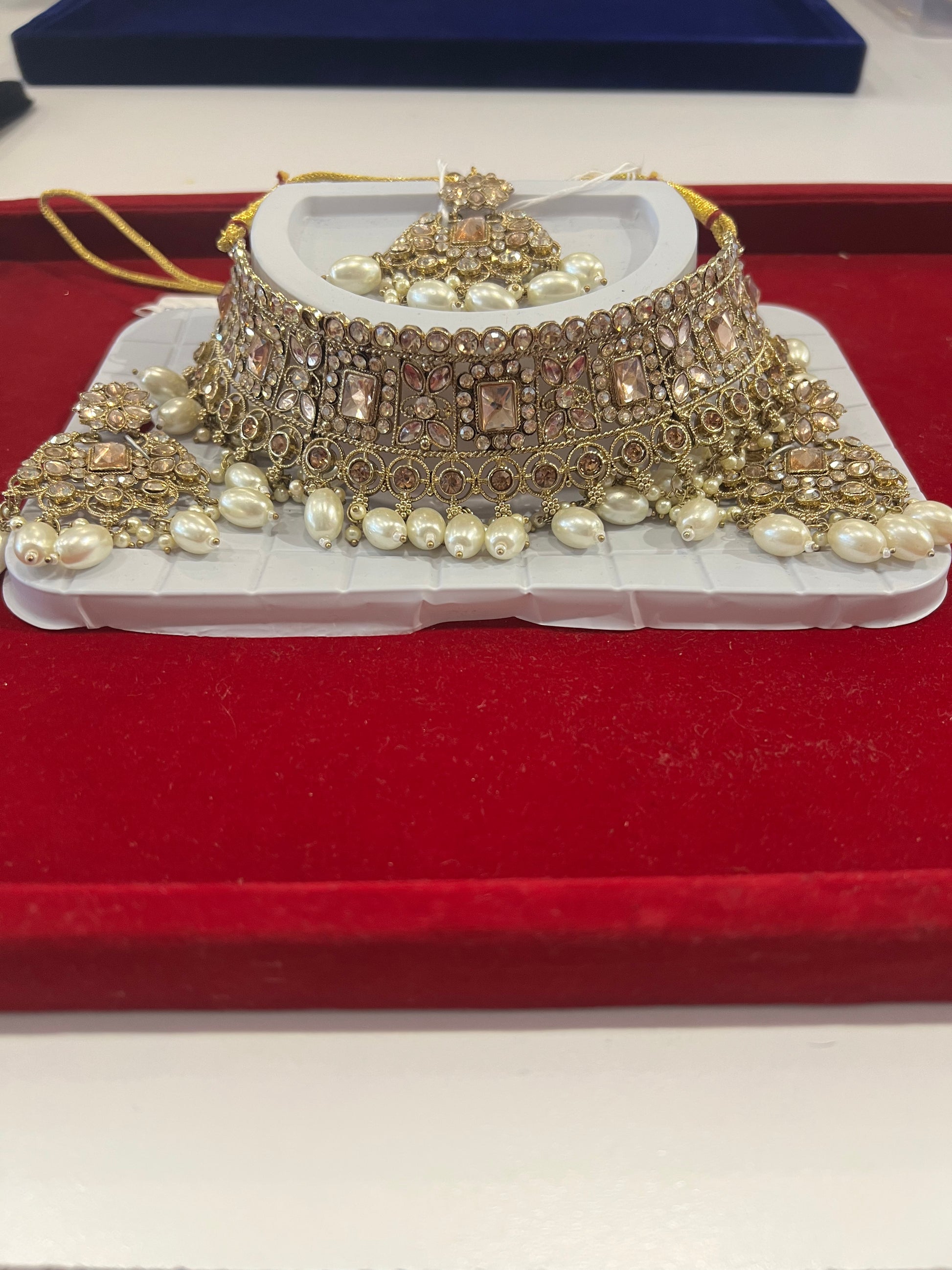 Amazing Light Pink Choker along with White beads With Maang Tikka And Earrings For Women
