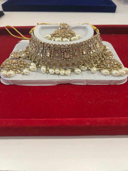 Amazing Light Pink Choker along with White beads With Maang Tikka And Earrings For Women