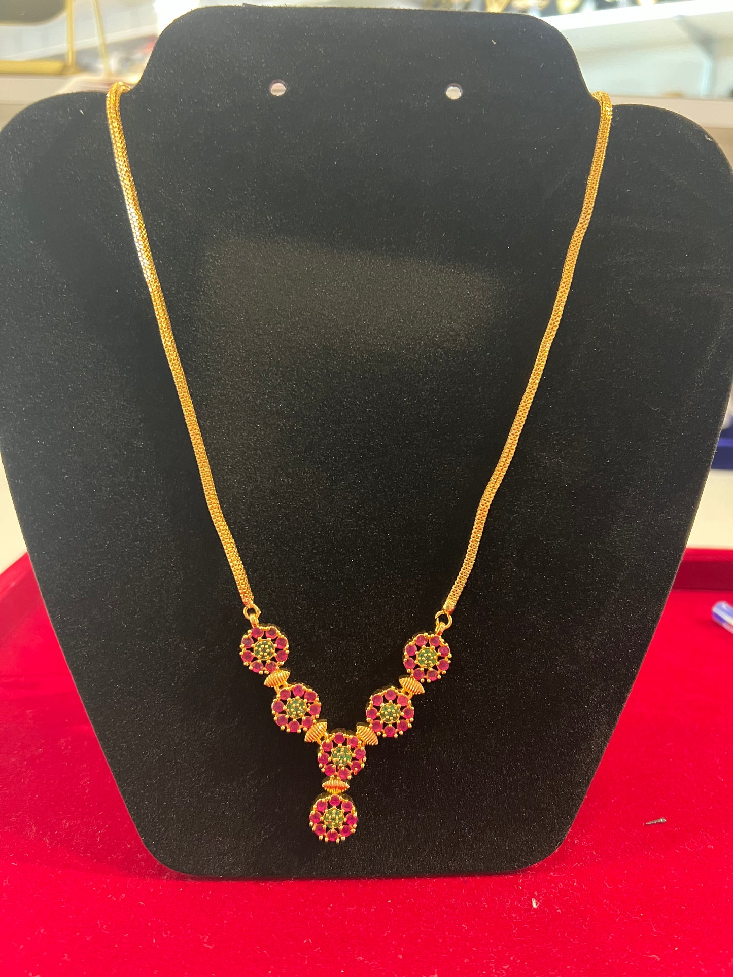 Appealing Red And Green Stones Gold Plated Necklace For Women