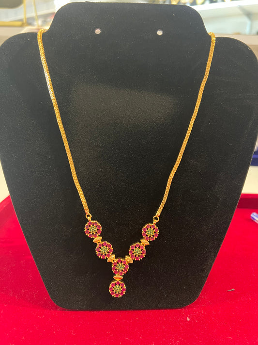 Appealing Red And Green Stones Gold Plated Necklace For Women