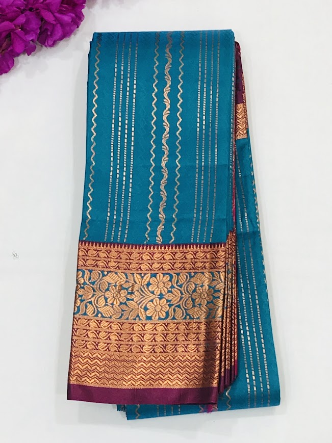 Delightful Teal Blue Color Art Silk With Contrast Border Unique Design Saree For Women