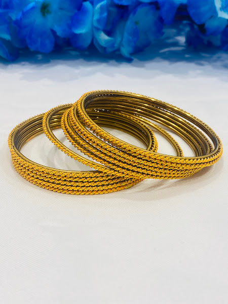 Fascinating Yellow Color Gold Plated Bangles With Plain Running Dots