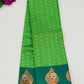 Alluring Green Embossed Art Silk Saree With Butta motifs And Contrast Pallu 