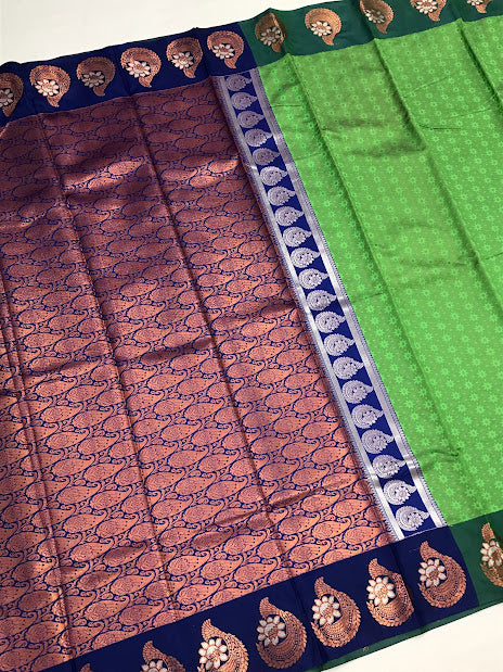 Alluring Green Embossed Art Silk Saree With Butta motifs And Contrast Pallu