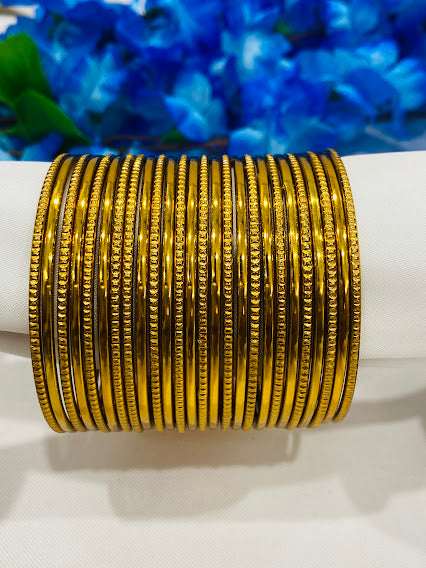Magnificent Gold Plated Partywear Thin Bangles With Plain Running Dots