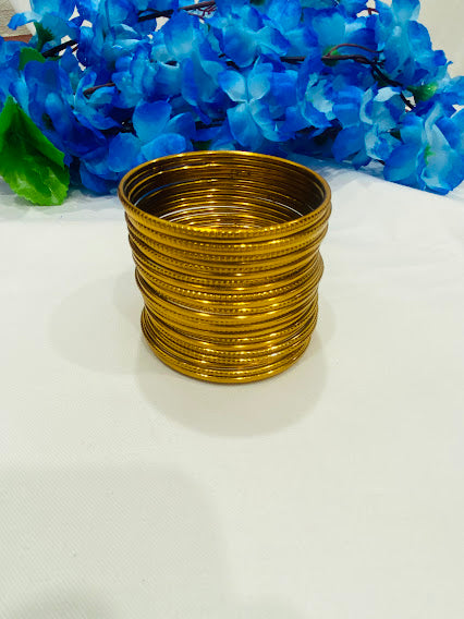 Magnificent Gold Plated Partywear Thin Bangles With Plain Running Dots