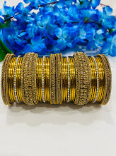 Mesmerizing Gold Plated Heavy Designed Wedding Bangles