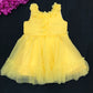 Alluring Yellow Colored Kids Party Wear Net Frock