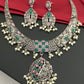 Charming Oxidized Floral Choker Necklace Set With Emerald And Pink Stone