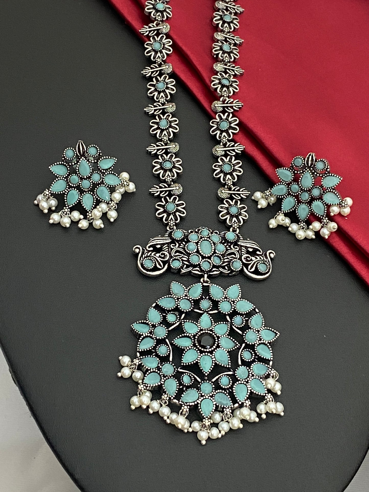 Fascinating Sky Blue Color Floweret Style And Pearl German Silver Oxidized Necklace With Earrings