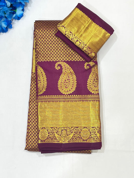 Fascinating Dark Purple Color Pure Kanchi Silk Gold Zari Work With Tassels Saree For Women