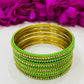 Pleasing Light Green Color Metal Bangles With Glittering Stones For Women