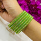 Pleasing Light Green Color Metal Bangles With Glittering Stones In Surprise