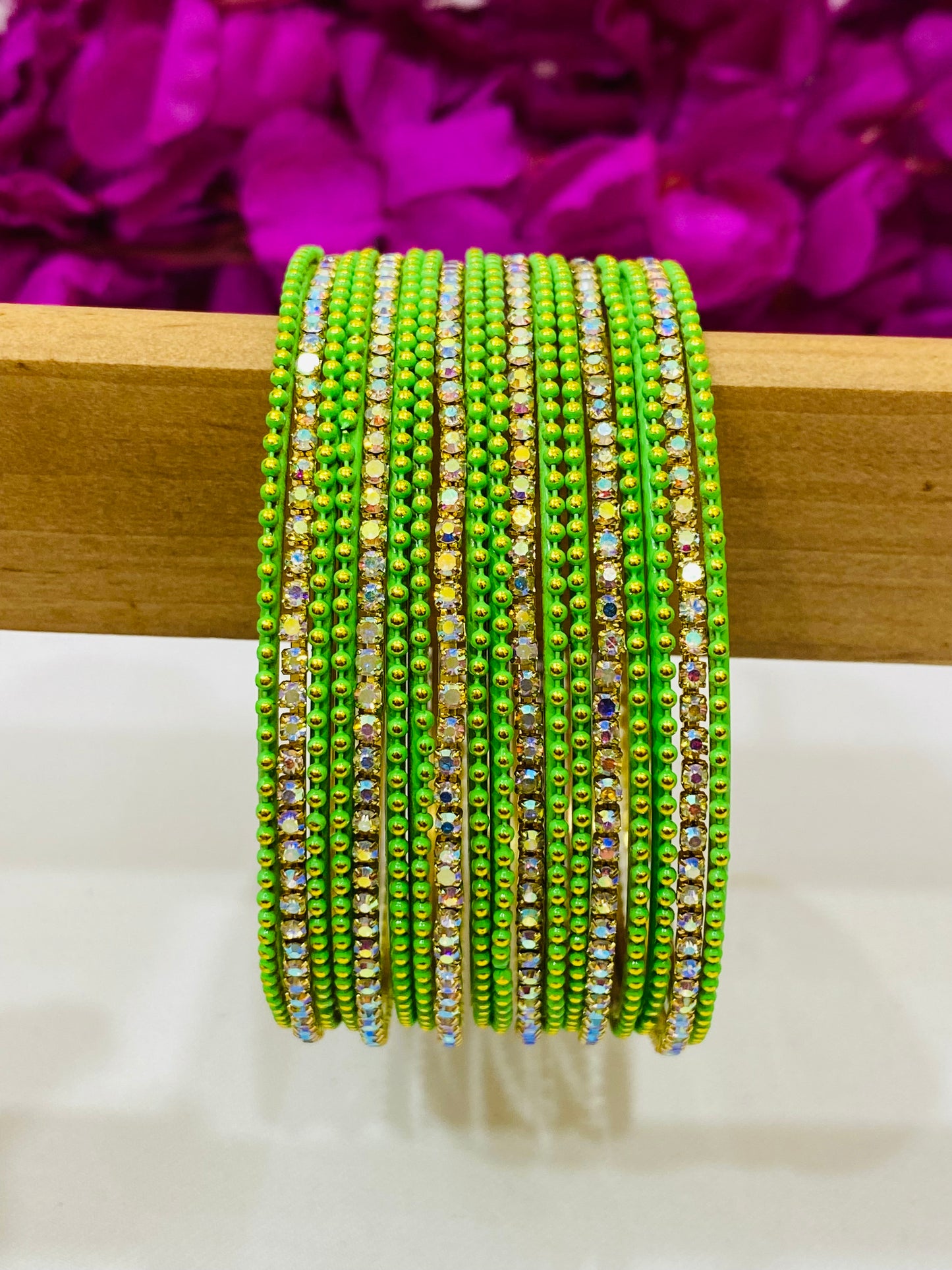 Pleasing Light Green Color Metal Bangles With Glittering Stones In Kingsman