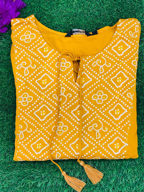 Alluring Yellow Color Rayon Kurti In Mesa