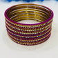 Appealing Purple Color Metal Bangles With Glistening Stones For Women