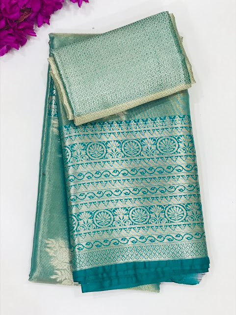 Charming Green Colored Pure Kanchi Tissue Silk With Silver Work Saree For Women