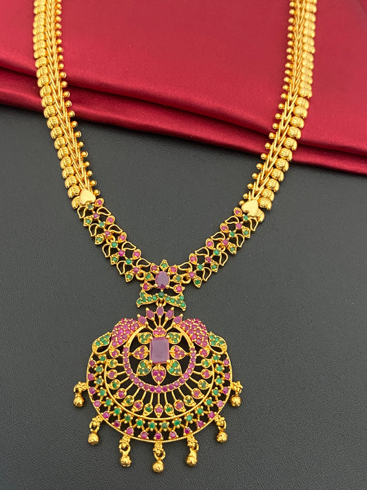 Attractive Party Wear Gold Plated Necklace With Ruby And Emerald Stones And Drops