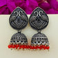 Alluring Oxidized Silver Peacock Design Jhumkas With Red Beard Hangings