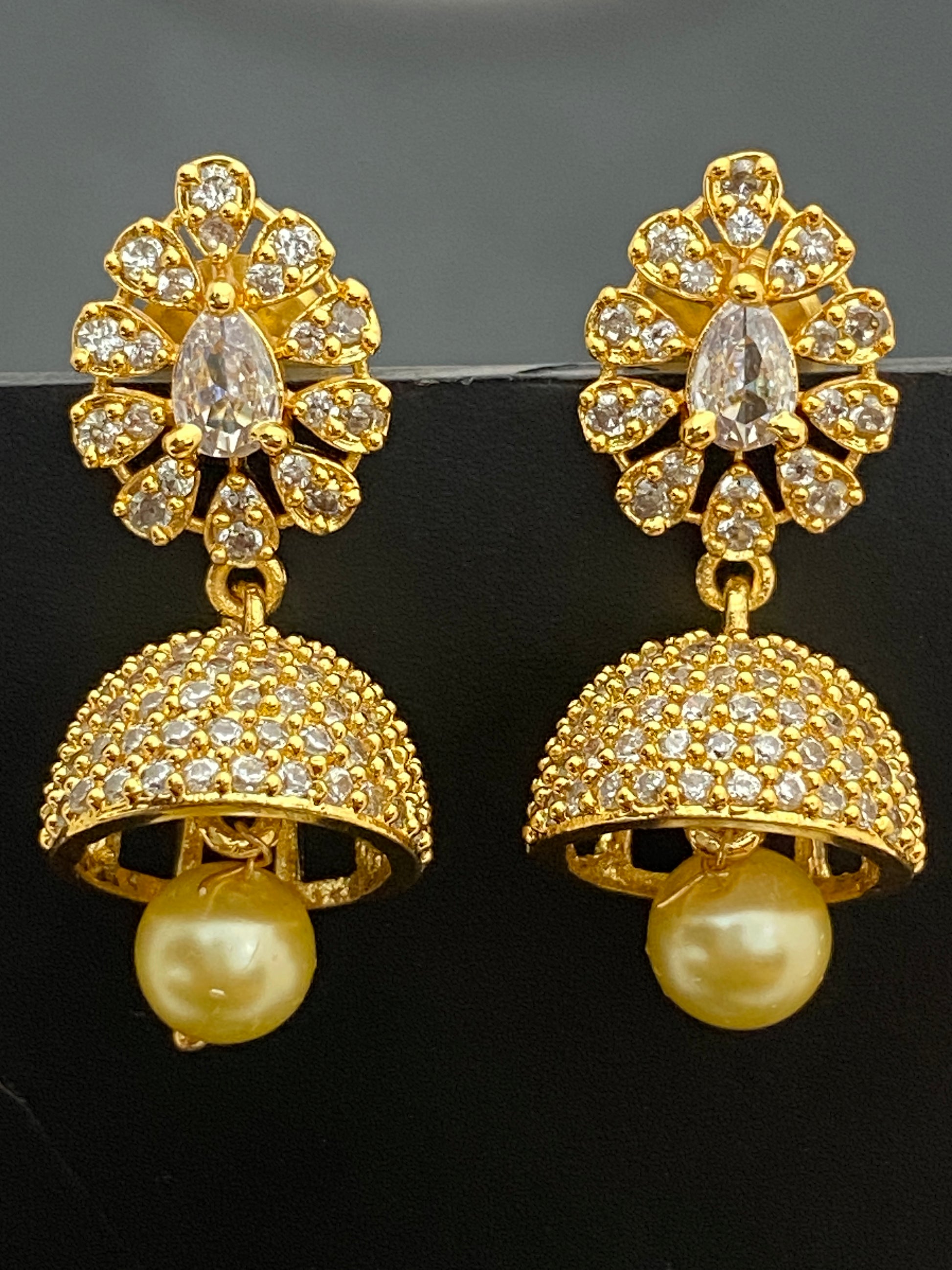 Dazzling Gold plated stoned Jumka Earrings