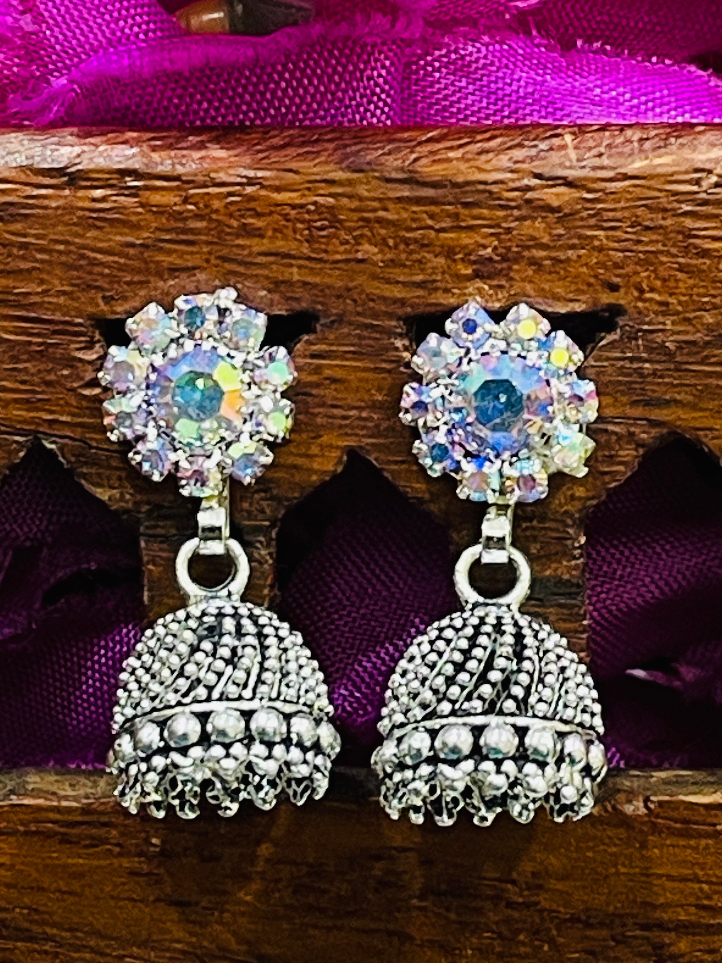 Alluring Silver Colored Oxidized Jumka Design Earrings Near Me
