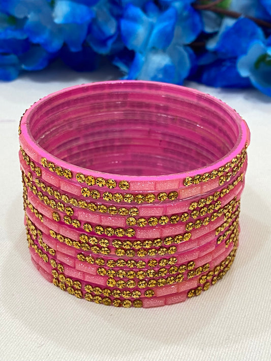 Alluring Rani Pink Color Stone Work Glass Bangles For Women