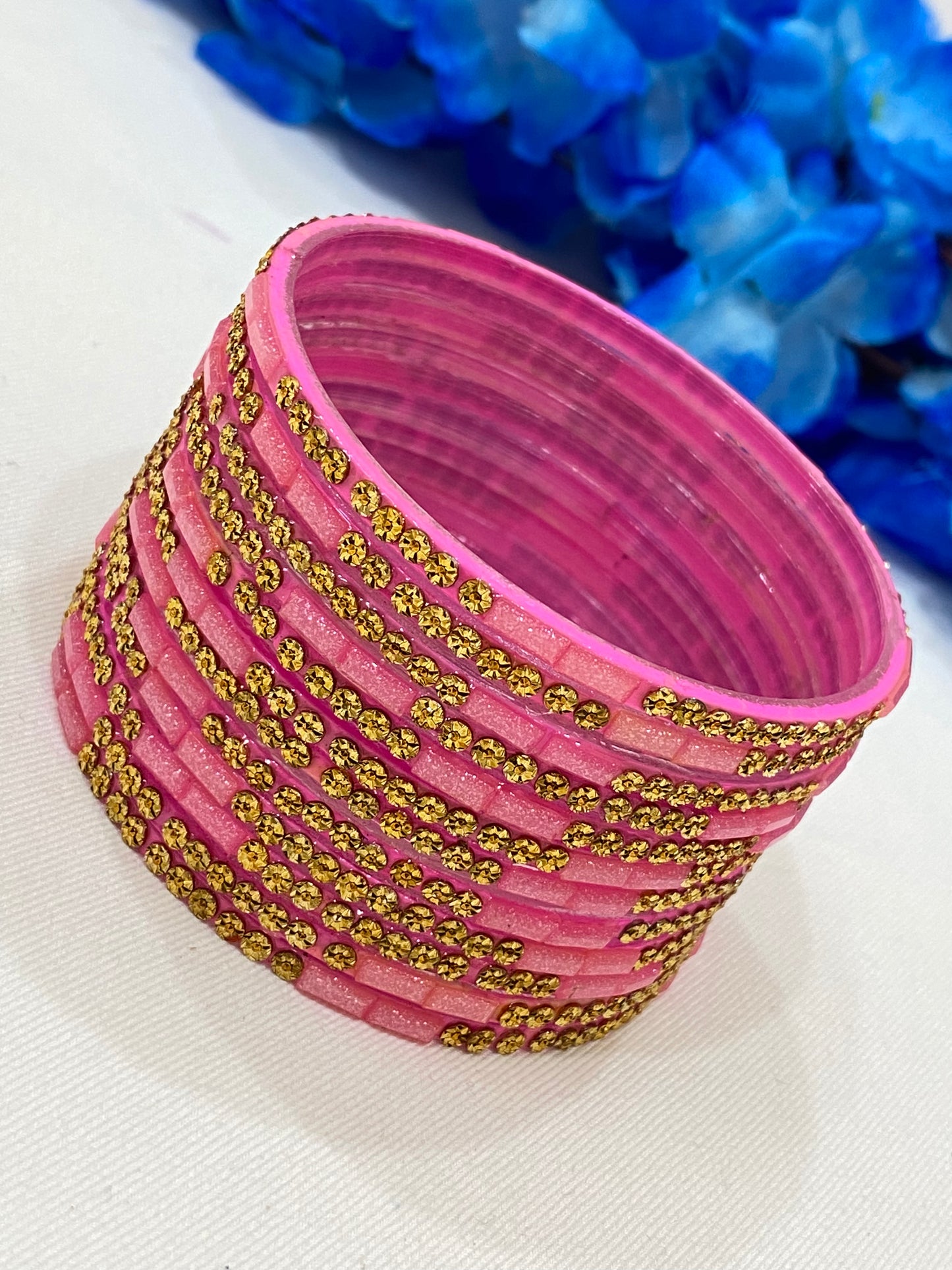 Alluring Rani Pink Color Stone Work Glass Bangles For Women