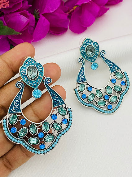 Pleasing Blue Stone With Blue Designer Earrings