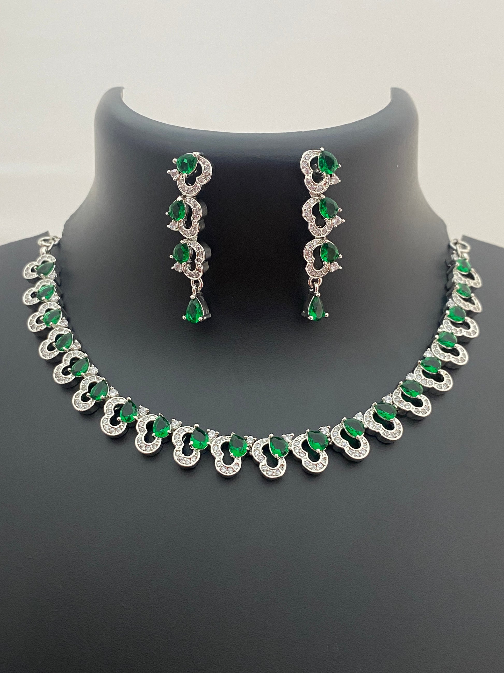 Charming Heart Designed American Diamond Necklace And Earrings With Green Color