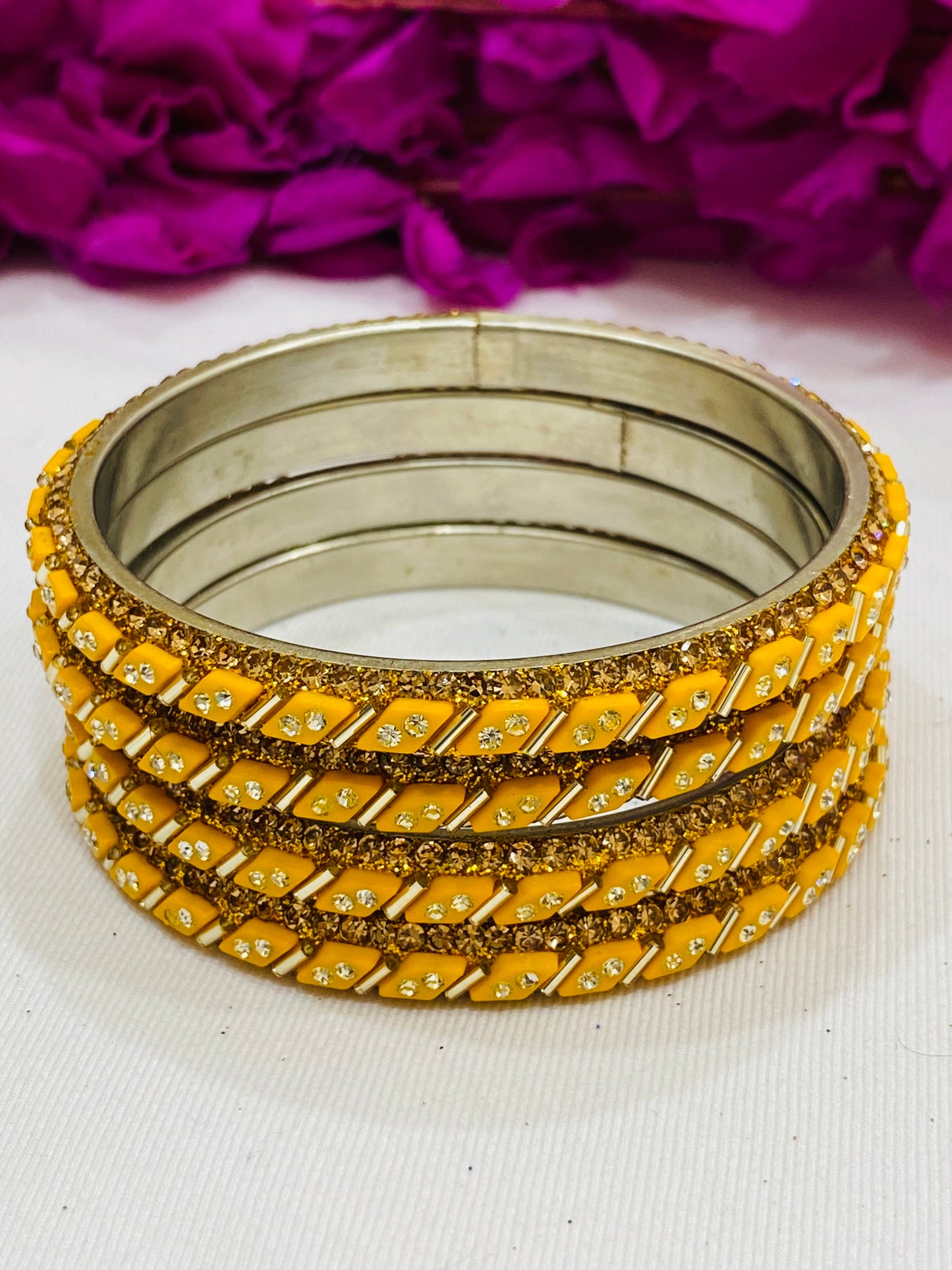 Lovely Yellow Color Designed Metal Bangles With White Stone For Women