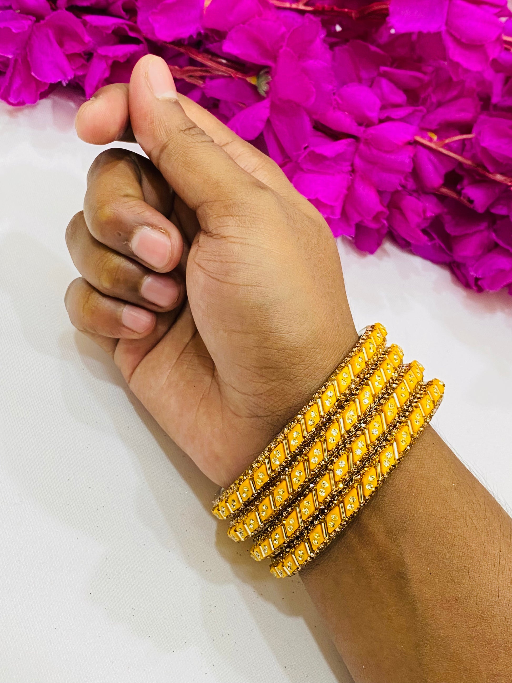 Yellow Color Designed Metal Bangles With White Stone In Chandler