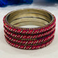 Lovely Dark Pink Color Metal Bangles With White Stone Work For Women