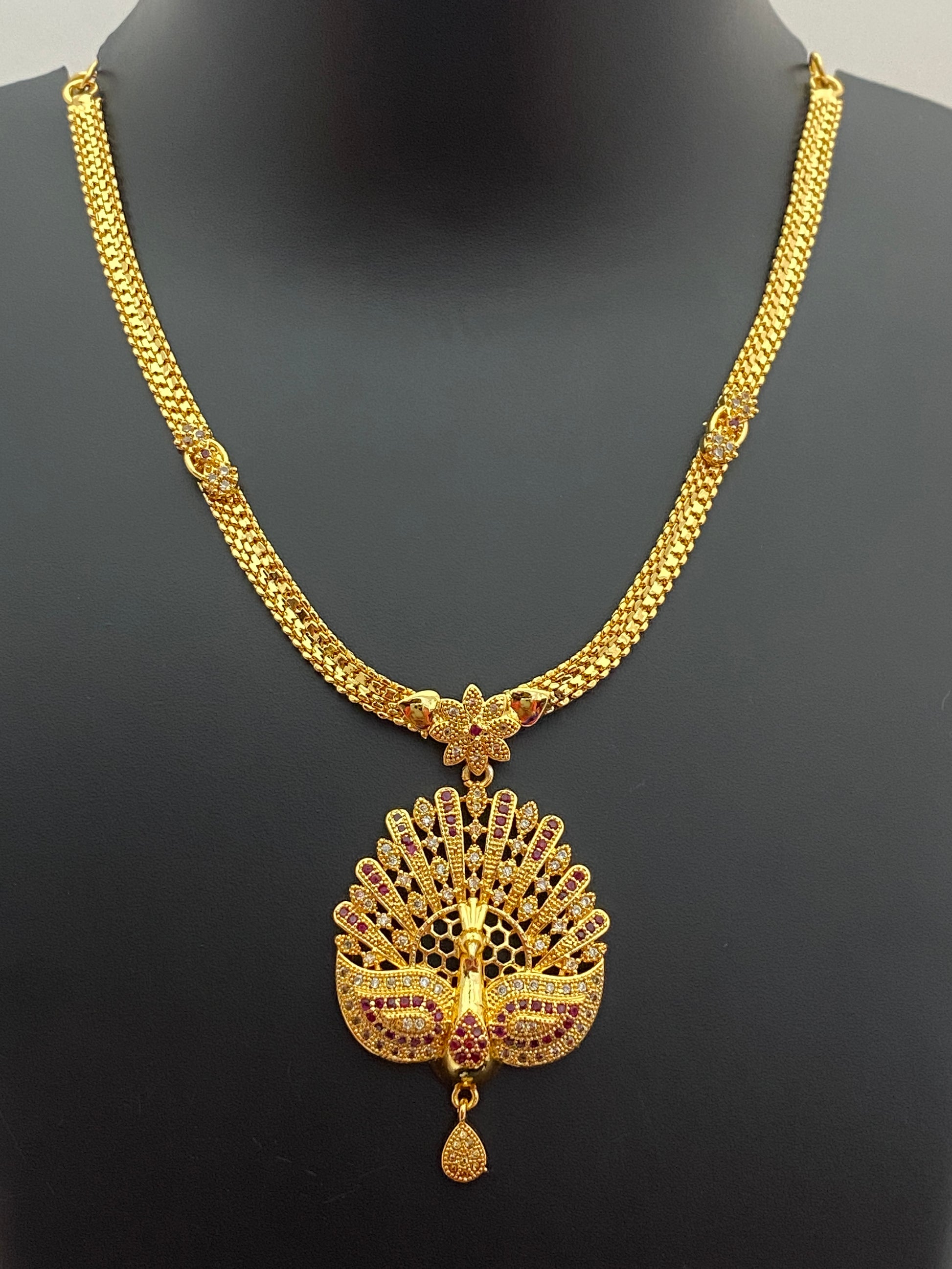 Delightful Floral Designer Gold Plated Necklace With Peacock Pendant