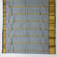 Gray Color Pure Kanchi Silk With Gold Zari Work And Blue Pallu Saree In Suncity