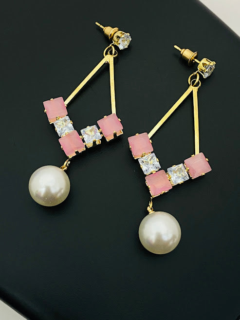Appealing traditional pink kundan danglers design with pearl drop Earrings