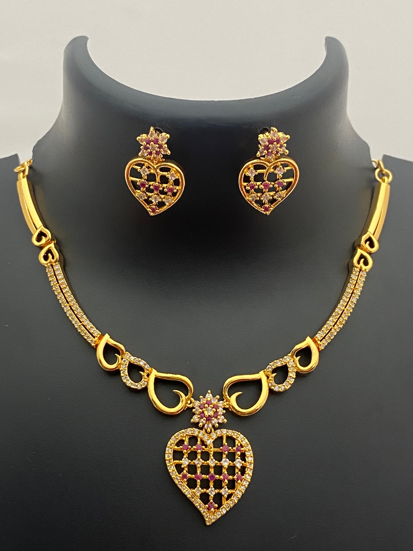 Lovely Heart Designed Gold Plated Necklace And Earrings With Ruby And White Stones