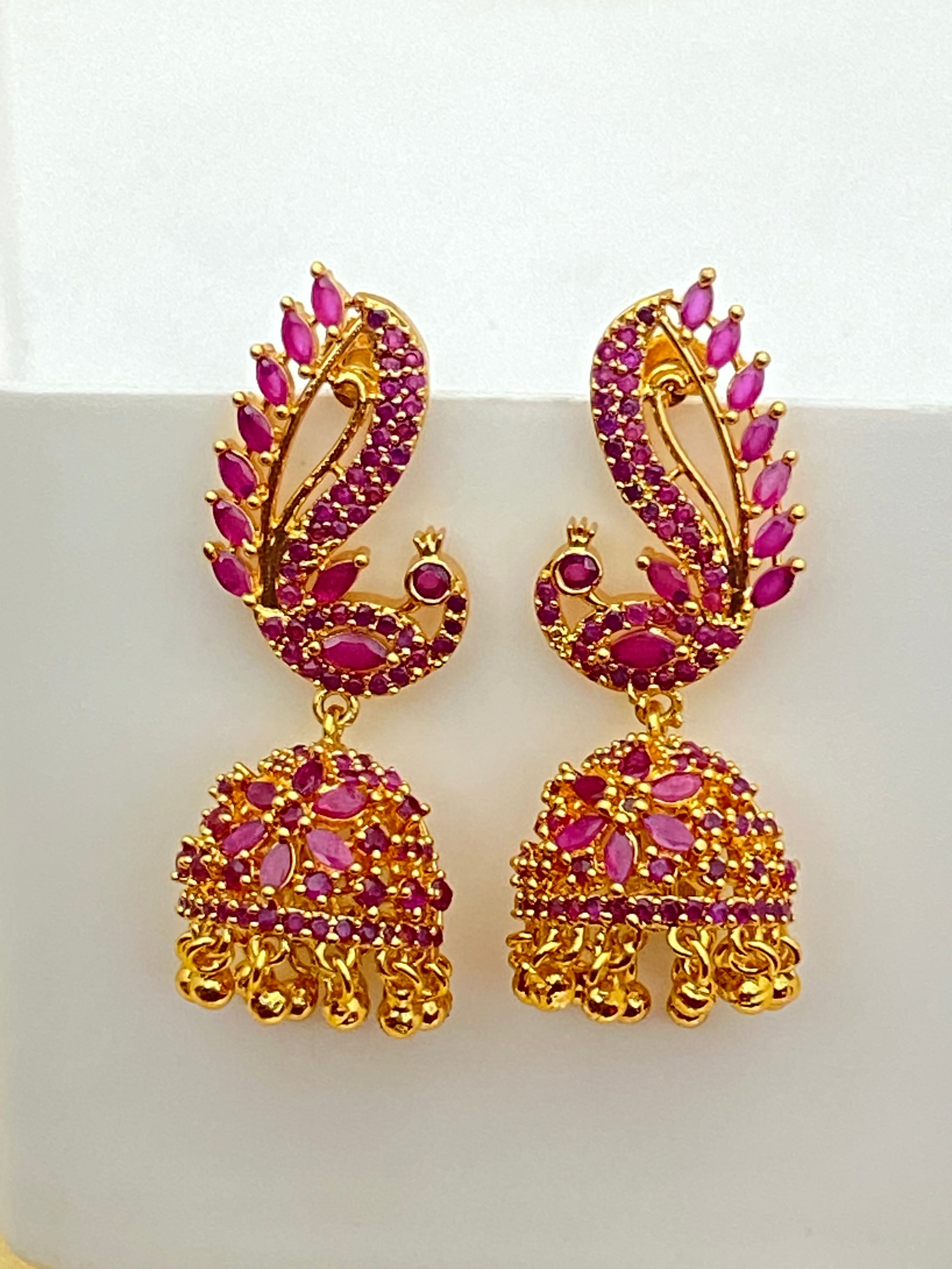 Attractive Golden Dancing Peacock Jhumka With Ruby Stones And Tear Drops