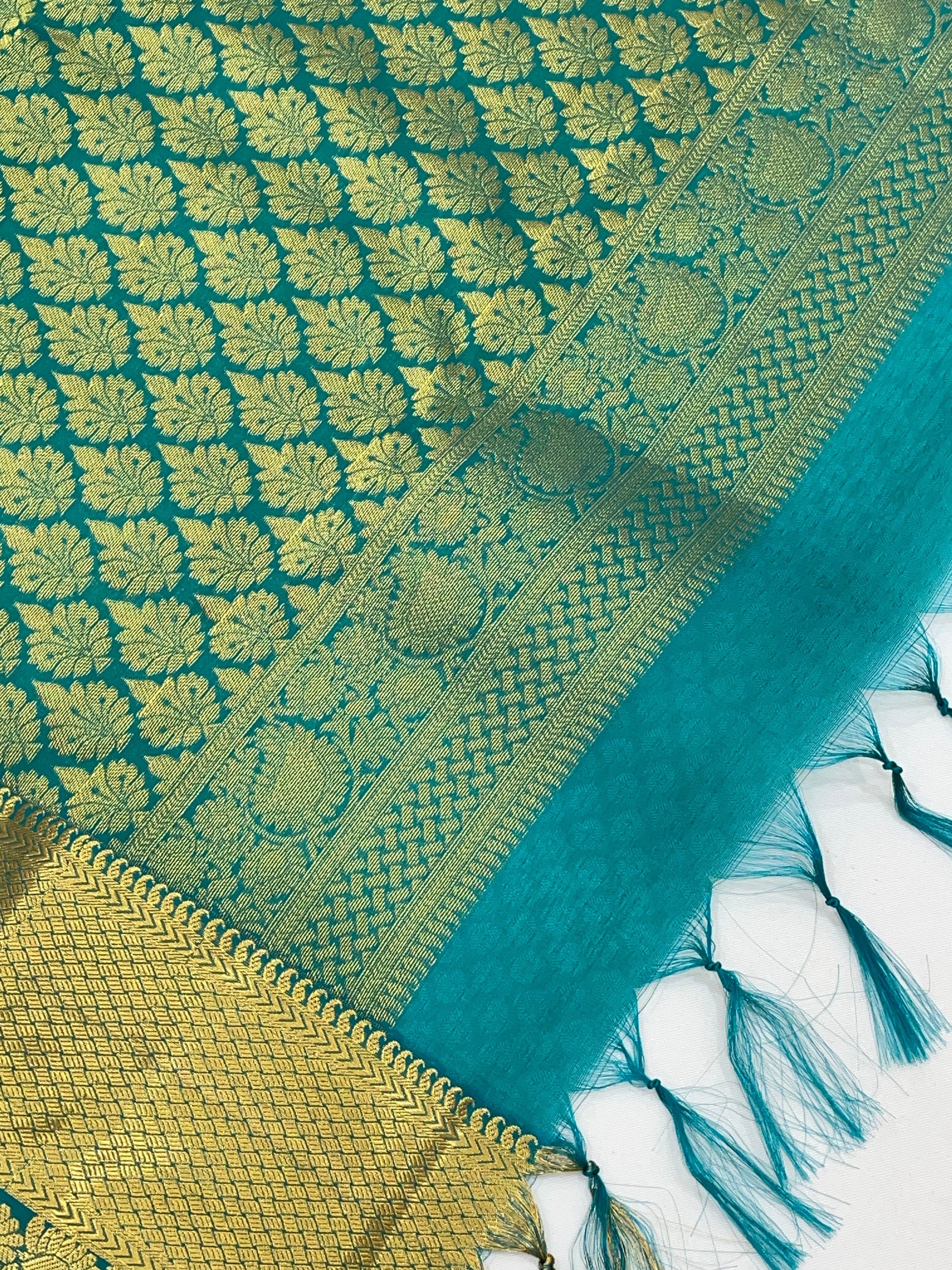 Green Color Pure Kanchi Silk With Gold Zari Work Saree In Surprise