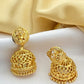 Dazzling Gold Plated Bridal Lakshmi Designed Jhumka Earrings With Tear Drops