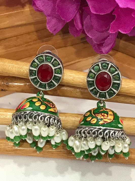 Elegant Green And Red Color Hand Painted Peacock Designed Oxidized Jhumka Earrings With Pearl Beads