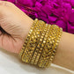 Amazing Party Wear Designer Bangles Set With Gold Stones For Women