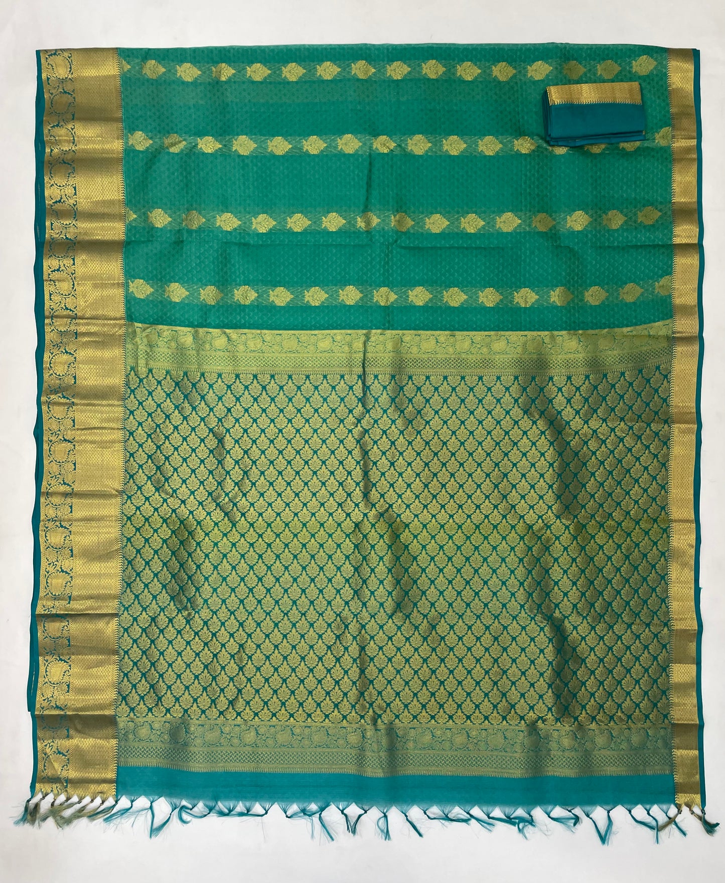 Green Color Pure Kanchi Silk With Gold Zari Work Saree In Yuma