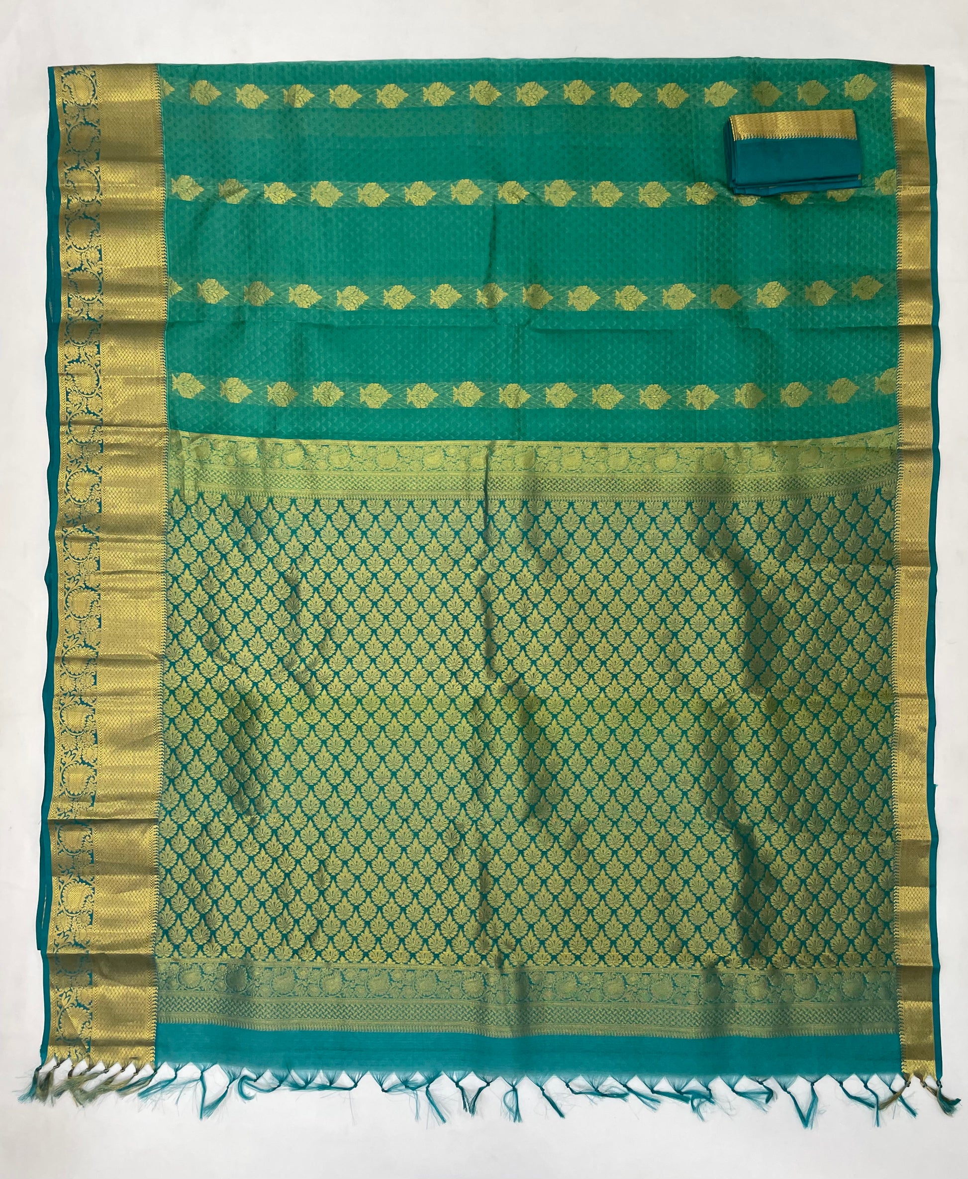 Green Color Pure Kanchi Silk With Gold Zari Work Saree In Yuma