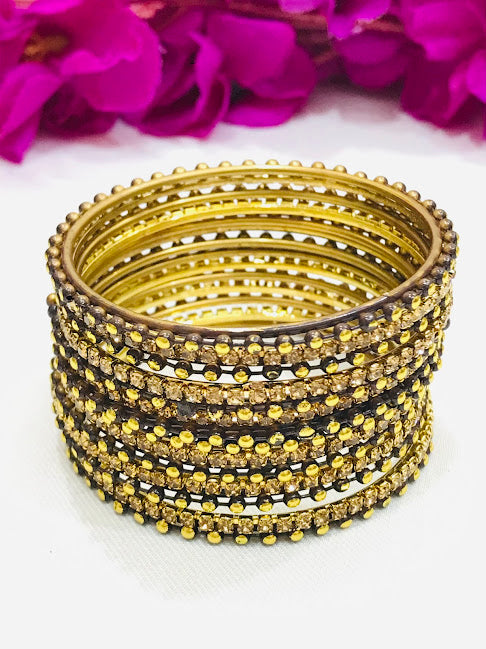 Gorgeous Black Colored Golden Stone And Dot Designed Bangles For Girls