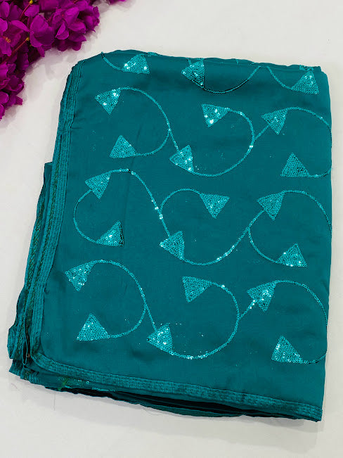 Lovely Teal Green Color Georgette Saree With Sequins And Moti Work
